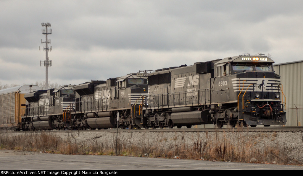 NS SD60E Locomotive leading a train